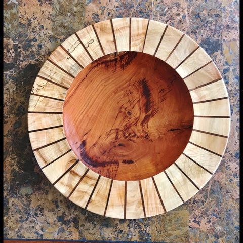 Wood Plate highlighted with a red and black dyed rim